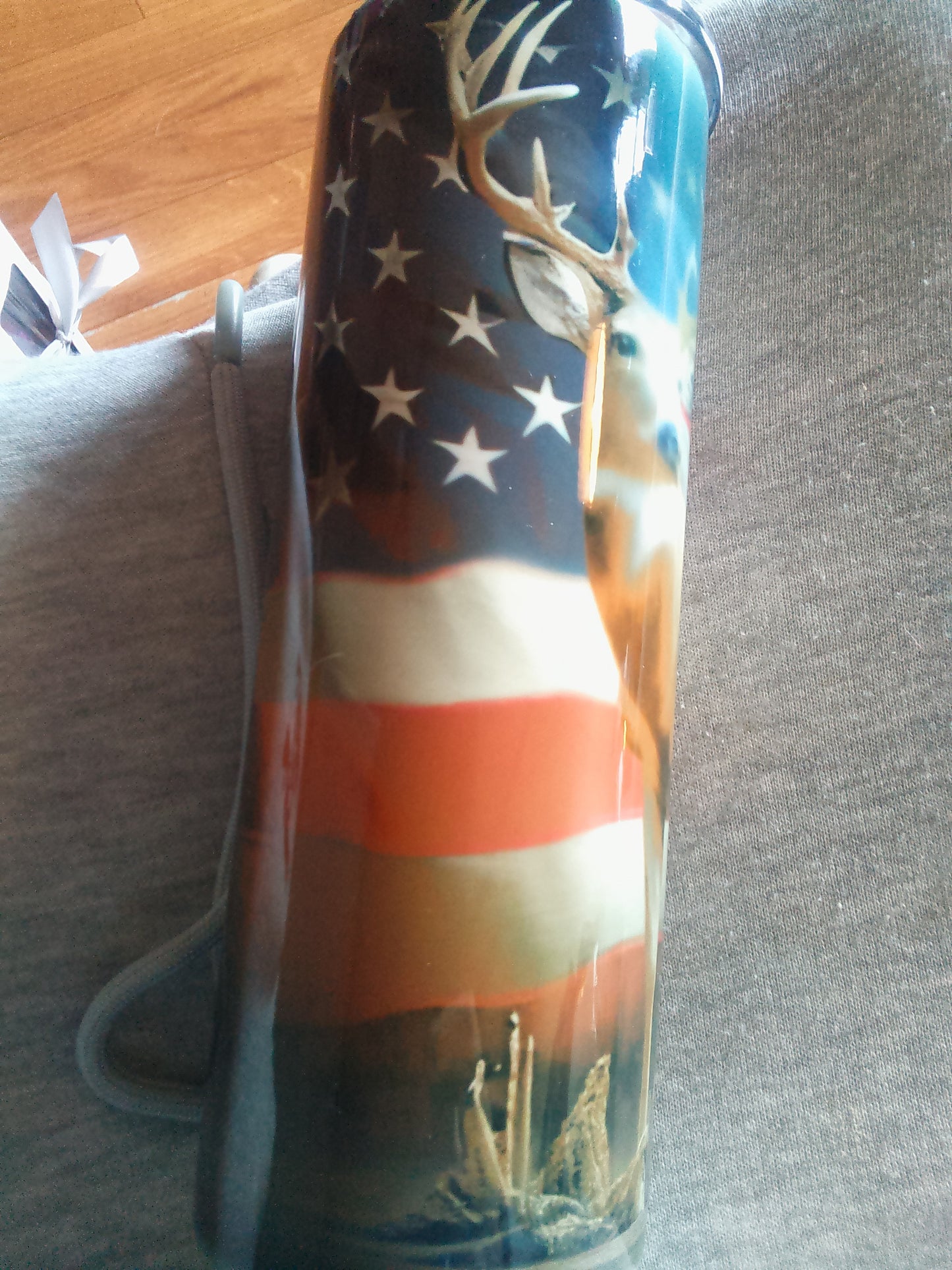 American flag with a buck tumbler